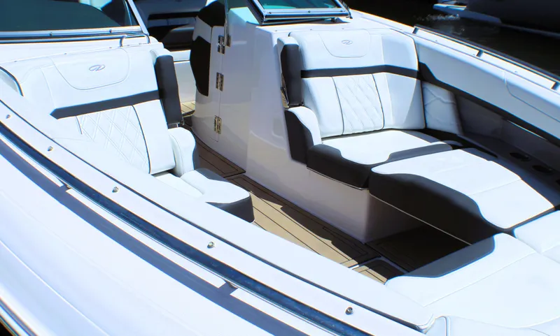 Sea M.a.j.i.c. Yacht Photos Pics 2022 Regal 33 OBX boat interior with luxurious seating and modern design.