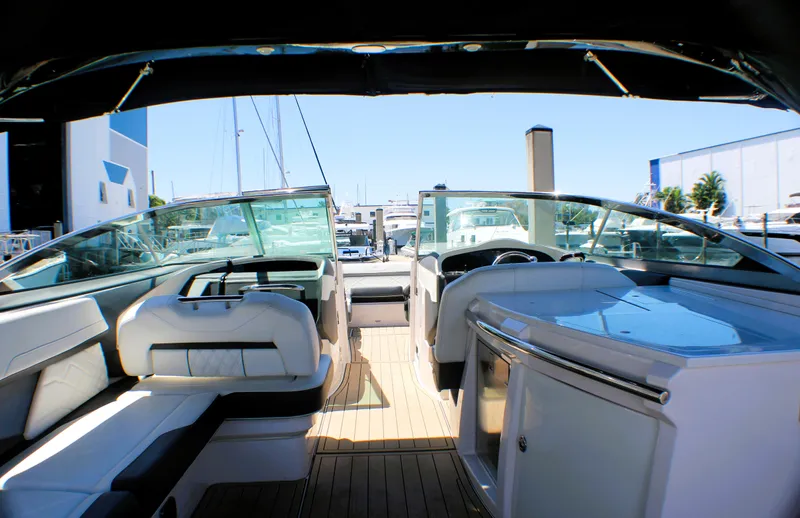 Sea M.a.j.i.c. Yacht Photos Pics 2022 Regal 33 OBX boat interior with luxurious seating and modern amenities.