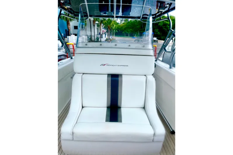  Yacht Photos Pics 2013 Midnight Express 39S Open boat seat with sleek white and black design.