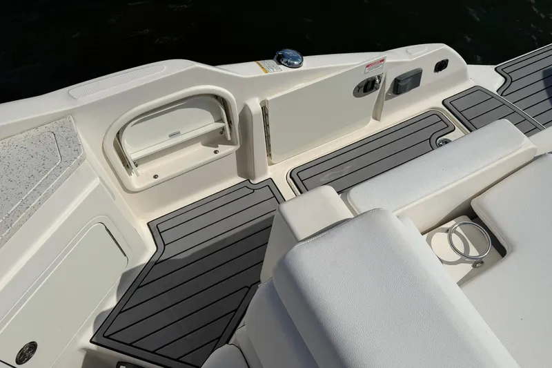  Yacht Photos Pics 2020 Sea Ray SDX 290 Outboard boat deck with seating and storage compartments.