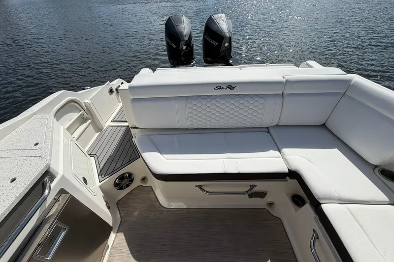 Yacht Photos Pics 2020 Sea Ray SDX 290 Outboard boat with white seating and dual engines on water.
