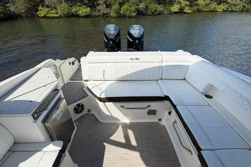  Yacht Photos Pics 2020 Sea Ray SDX 290 Outboard boat interior with white seating and dual engines.