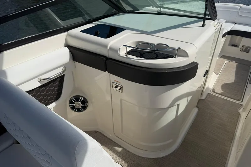  Yacht Photos Pics 2020 Sea Ray SDX 290 Outboard interior with cup holders and speaker.