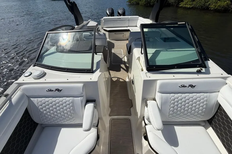  Yacht Photos Pics 2020 Sea Ray SDX 290 Outboard boat interior with white seating and dual consoles.