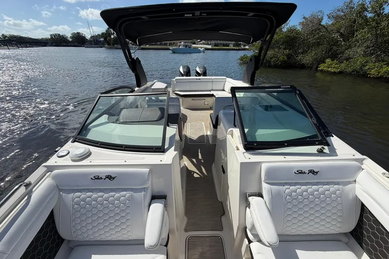  Yacht Photos Pics 2020 Sea Ray SDX 290 Outboard boat interior with luxurious seating on a sunny day.