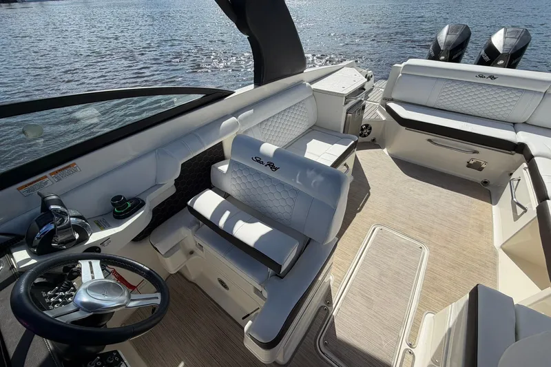  Yacht Photos Pics 2020 Sea Ray SDX 290 Outboard boat interior with luxurious seating and dual outboard engines.