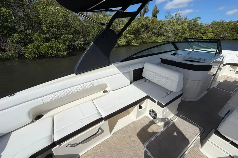  Yacht Photos Pics 2020 Sea Ray SDX 290 Outboard boat interior with white seating and sleek design.