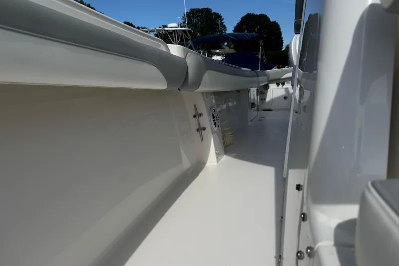  Yacht Photos Pics 2022 Regulator 31 boat interior, showcasing sleek design and spacious deck layout.