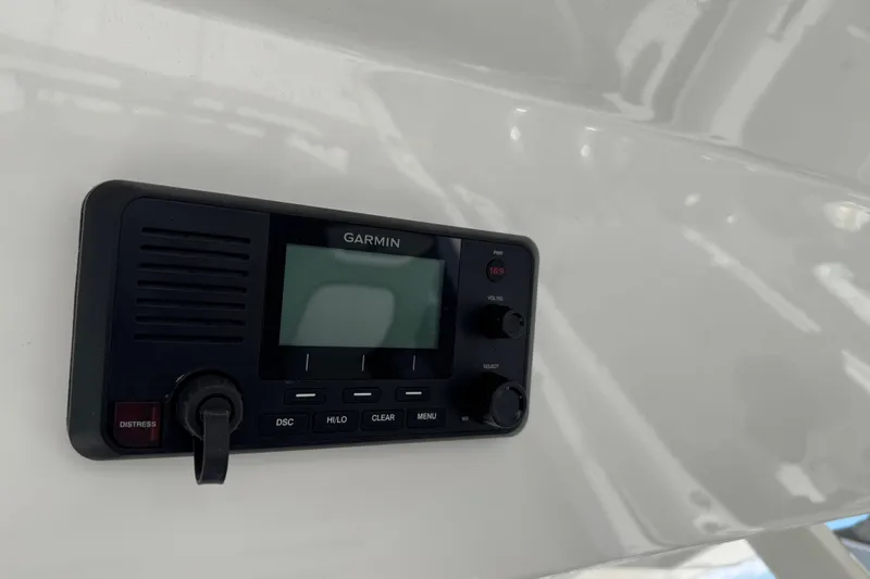  Yacht Photos Pics Garmin marine radio on 2022 Regulator 31 boat dashboard.