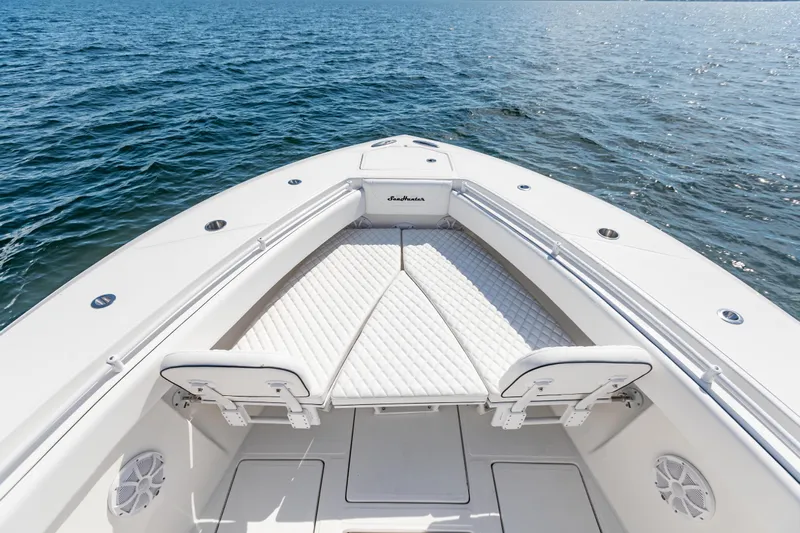  Yacht Photos Pics 2020 SeaHunter 33 Tournament boat bow with cushioned seating on open water.