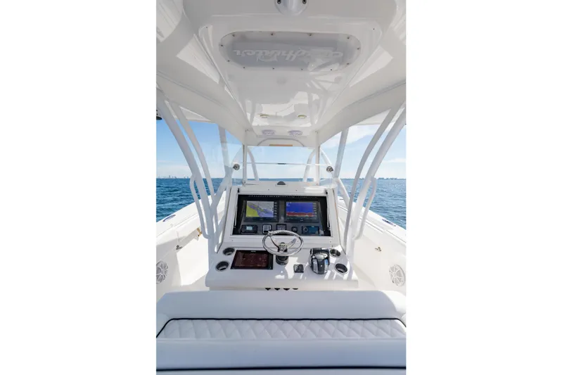  Yacht Photos Pics 2020 SeaHunter 33 Tournament boat cockpit with advanced navigation system on open water.