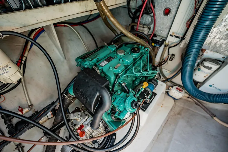 Bellamaggio Yacht Photos Pics Engine room of 2008 Fountaine Pajot Salina 48 Evolution catamaran, showcasing mechanical components.