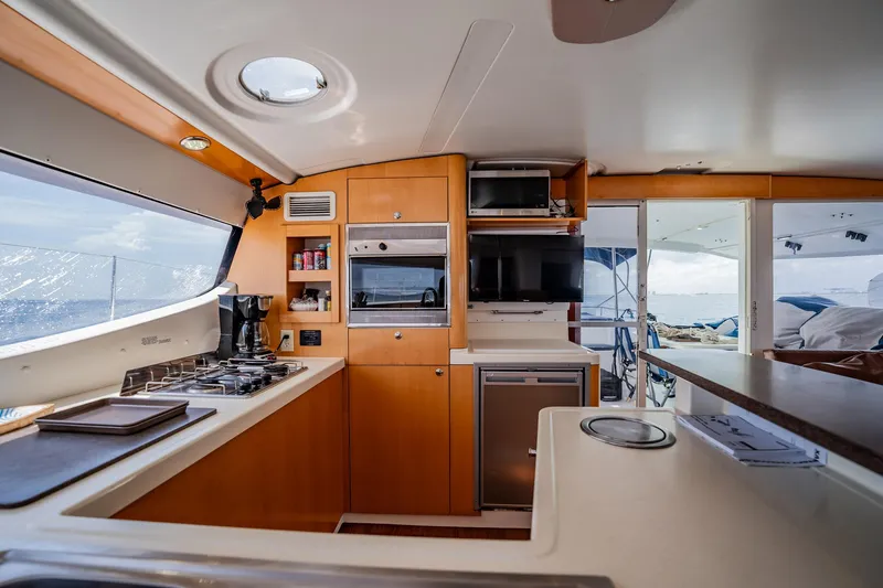 Bellamaggio Yacht Photos Pics Luxurious kitchen interior of 2008 Fountaine Pajot Salina 48 Evolution catamaran.