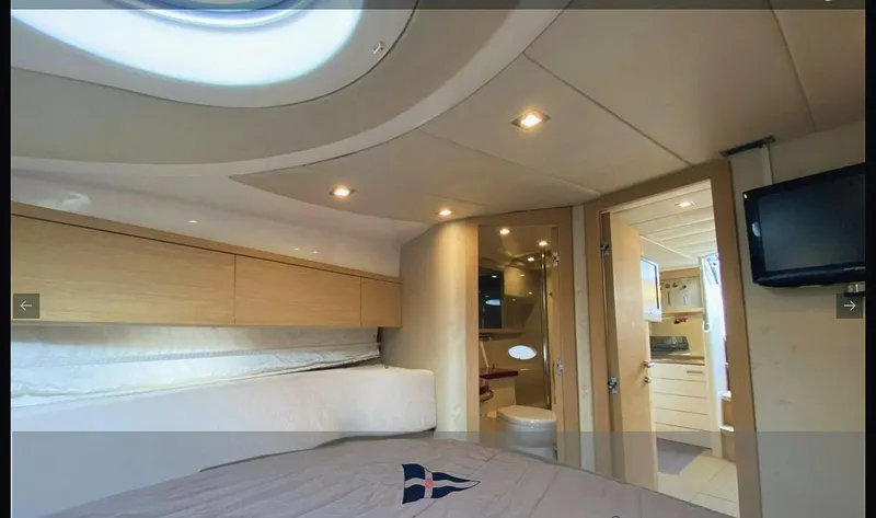  Yacht Photos Pics Luxurious interior of 2008 Sessa Marine C42 HT yacht cabin with modern amenities.