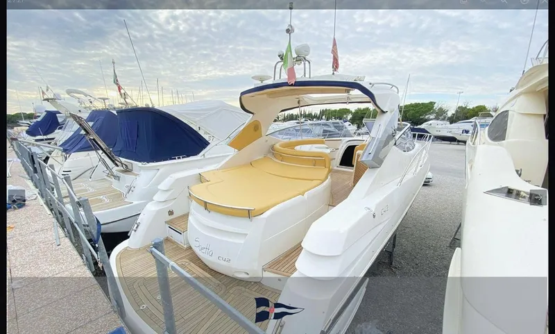  Yacht Photos Pics 2008 Sessa Marine C42 HT yacht docked, featuring sleek design and spacious deck.