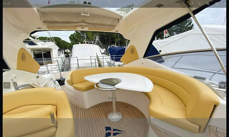  Yacht Photos Pics Luxurious 2008 Sessa Marine C42 HT yacht interior with yellow seating and sleek design.