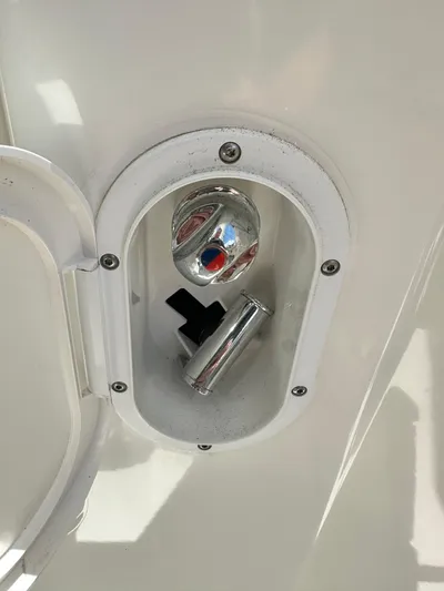Oceans Edge Yacht Photos Pics Water inlet on 2022 Beneteau Swift Trawler 35, featuring chrome cap and housing.