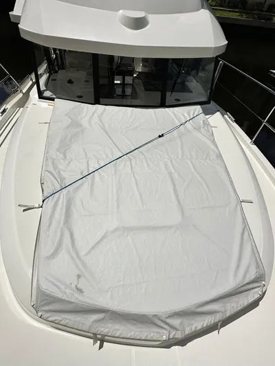 Oceans Edge Yacht Photos Pics 2022 Beneteau Swift Trawler 35 deck with protective cover.