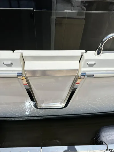 Oceans Edge Yacht Photos Pics 2022 Beneteau Swift Trawler 35, rear deck view with stainless steel accents.