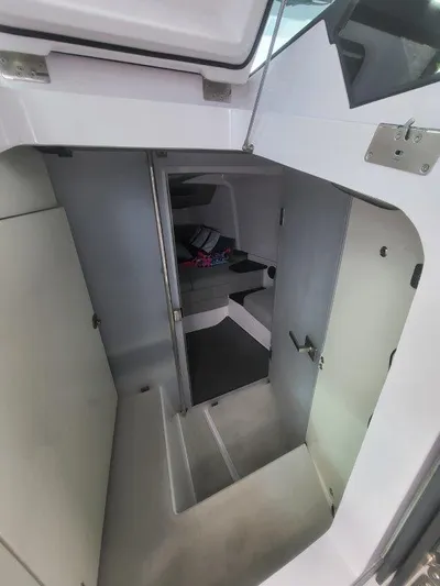  Yacht Photos Pics Interior cabin of 2024 Axopar 37 XC CROSS CABIN, featuring modern design and compact space.