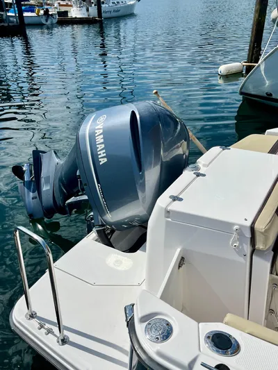  Yacht Photos Pics 2018 Ranger Tugs R-27 with Yamaha outboard motor docked in marina.