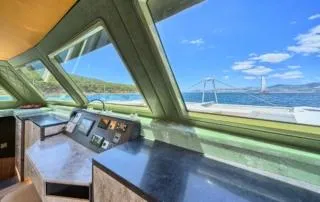 Orange Yacht Photos Pics Modern Luna 47 yacht interior with panoramic windows overlooking the ocean, 2023 model.