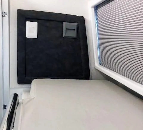 Pilar X Yacht Photos Pics 2024 Leeuwin 55 interior with bed and window blinds.