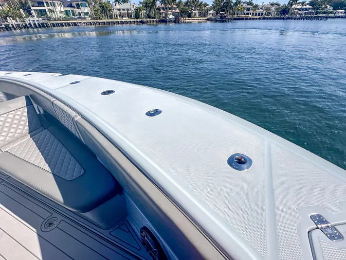  Yacht Photos Pics 2021 SeaVee 370z boat deck with waterfront view and luxurious seating.
