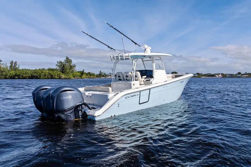 No Name Yacht Photos Pics 2023 Cobia 350 Center Console boat on water with Yamaha engines.