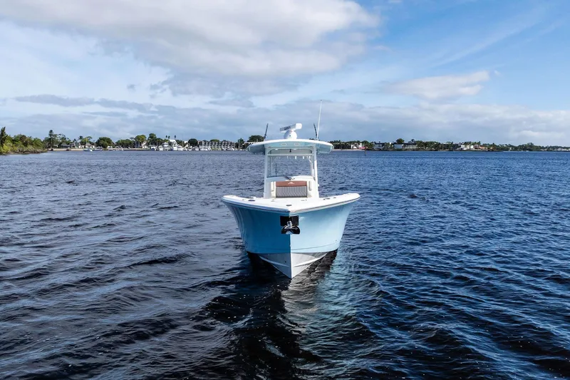 No Name Yacht Photos Pics 2023 Cobia 350 Center Console boat on open water under blue sky.