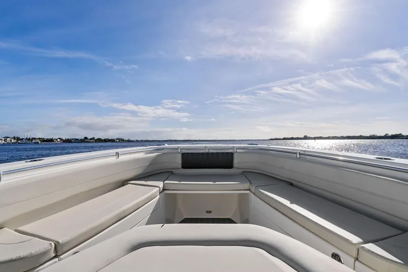 No Name Yacht Photos Pics 2023 Cobia 350 Center Console boat interior with ocean view and sunny sky.
