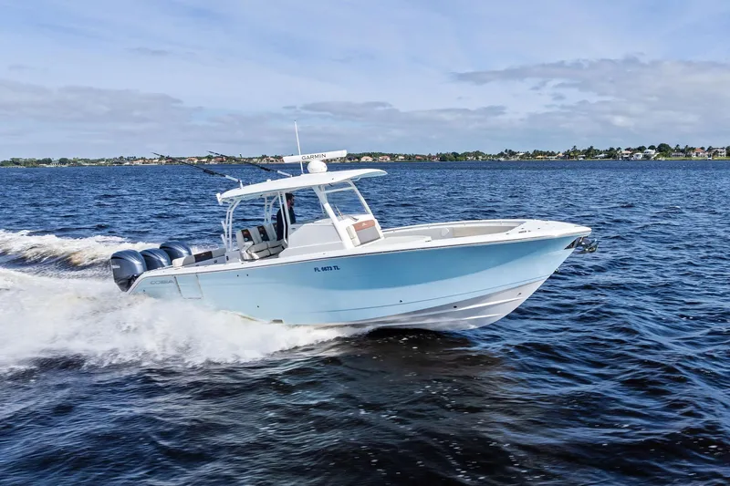 No Name Yacht Photos Pics 2023 Cobia 350 Center Console boat cruising on open water.