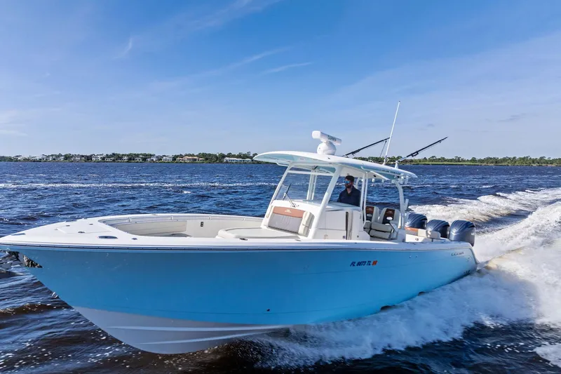 No Name Yacht Photos Pics 2023 Cobia 350 Center Console boat cruising on open water.