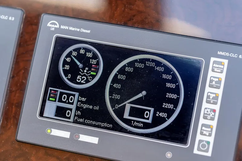  Yacht Photos Pics Dashboard of a 2008 Sunseeker Manhattan 70 yacht, displaying engine oil and fuel consumption.