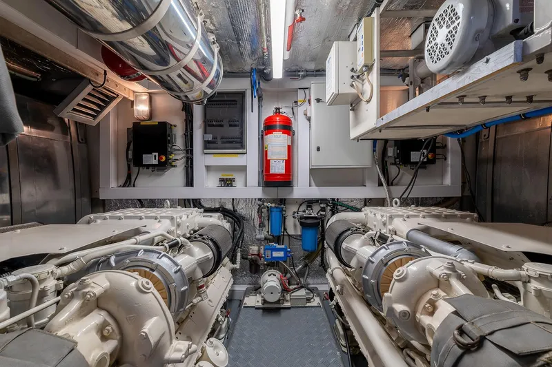  Yacht Photos Pics Engine room of 2008 Sunseeker Manhattan 70 yacht, featuring dual engines and safety equipment.