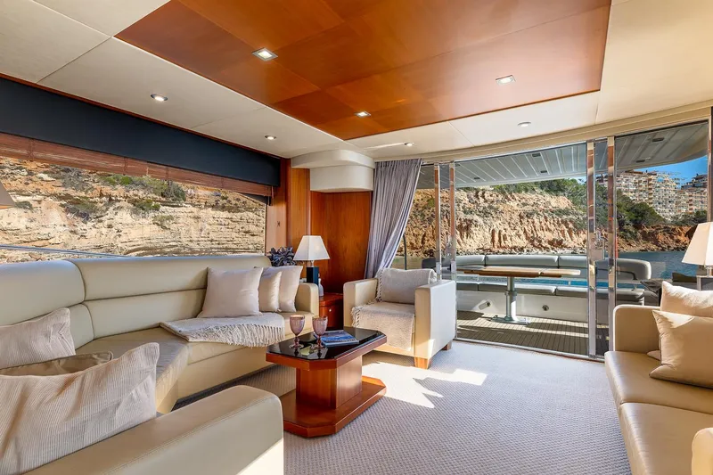  Yacht Photos Pics Luxurious interior of 2008 Sunseeker Manhattan 70 yacht with elegant seating and scenic views.