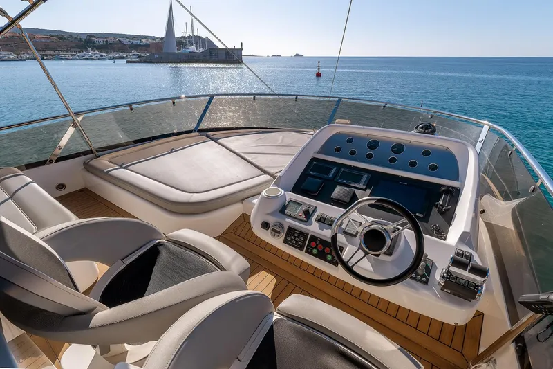  Yacht Photos Pics Flybridge of 2008 Sunseeker Manhattan 70 yacht with ocean view and modern controls.