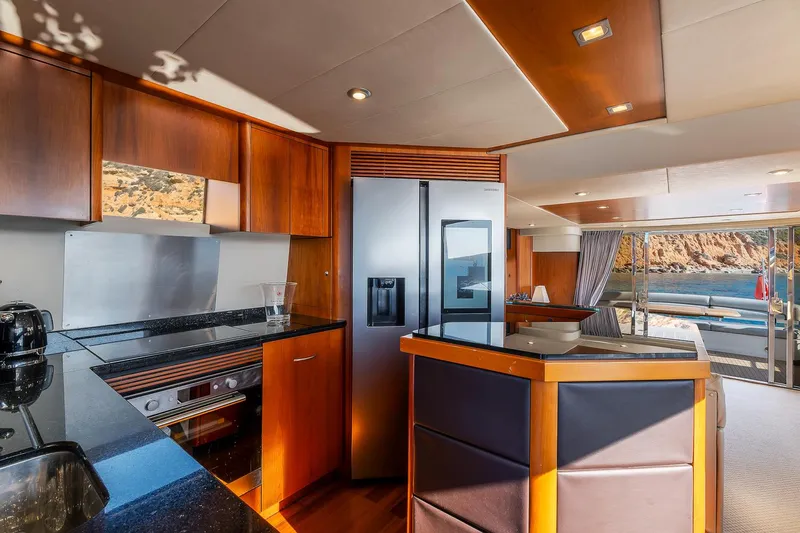  Yacht Photos Pics Luxurious kitchen interior of 2008 Sunseeker Manhattan 70 yacht with modern appliances.