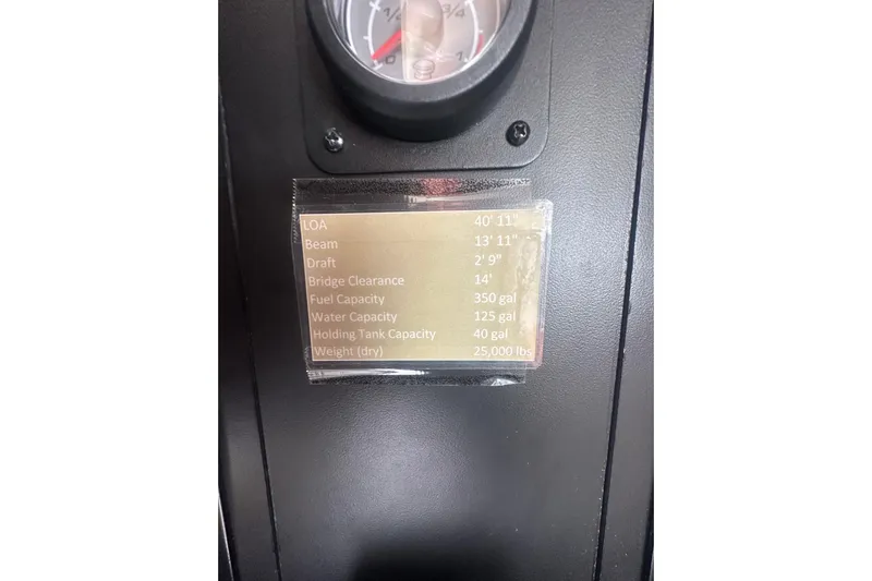 Havadk Yacht Photos Pics 2010 Meridian 391 Sedan specifications plaque with gauge, showing dimensions and capacities.