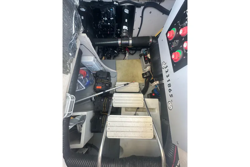 Havadk Yacht Photos Pics Engine room of 2010 Meridian 391 Sedan with visible components and wiring.