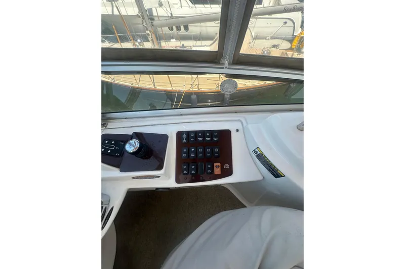 Havadk Yacht Photos Pics Control panel of a 2010 Meridian 391 Sedan yacht, featuring various switches and controls.