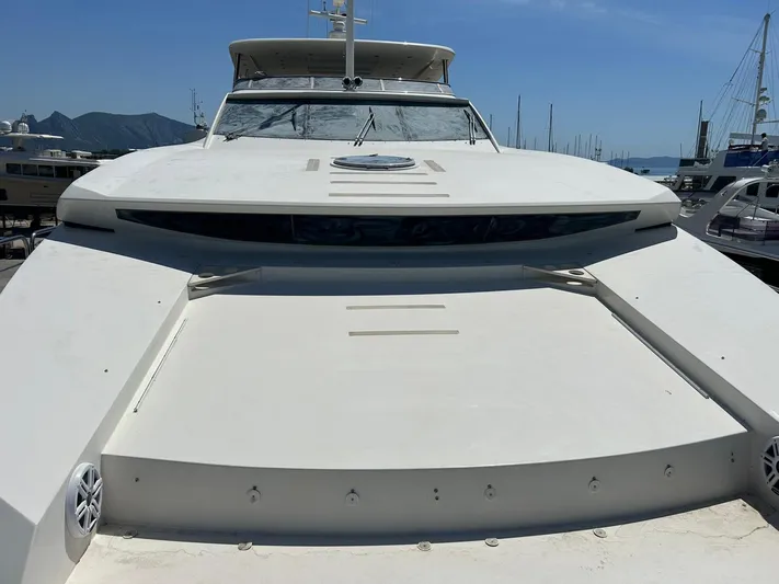 Paladium Yacht Photos Pics Sunseeker 30 Metre Yacht 2010, docked with clear sky and marina background.