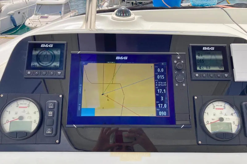 Lucky Vibes Yacht Photos Pics Navigation system on a 2018 Lagoon 42 catamaran, displaying charts and instruments.