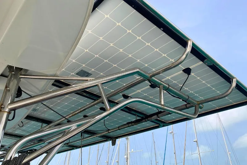 Lucky Vibes Yacht Photos Pics Solar panels on a 2018 Lagoon 42 catamaran with stainless steel framework.