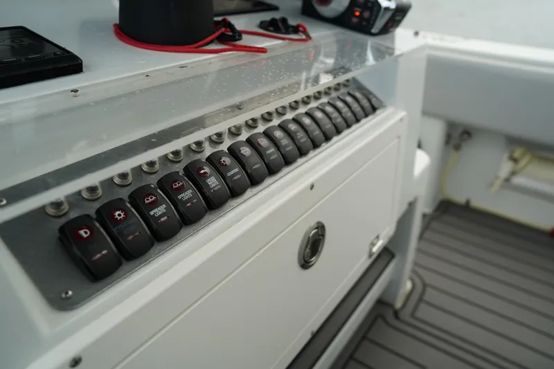  Yacht Photos Pics Control panel of 2023 Andros 32 Offshore boat with switches and gauges.