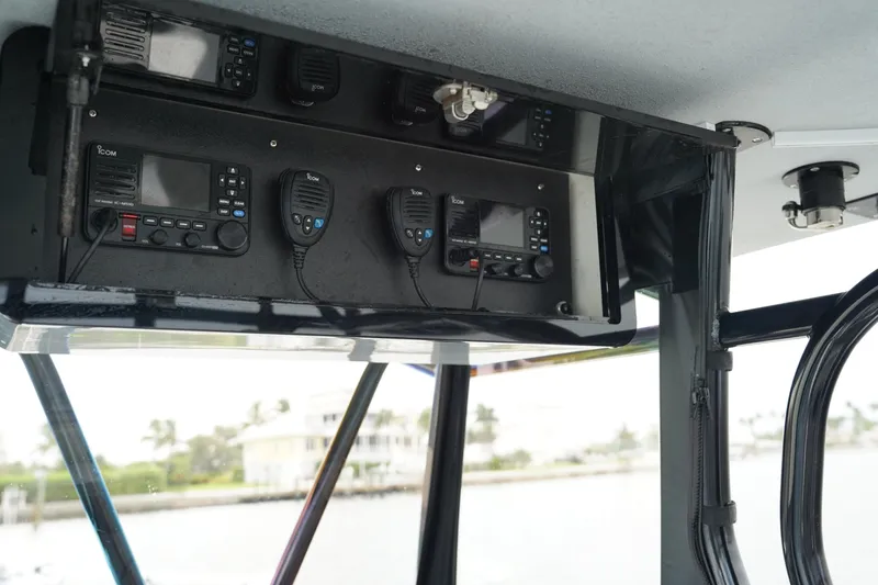  Yacht Photos Pics Andros 32 Offshore 2023 boat communication system with multiple radios and controls.