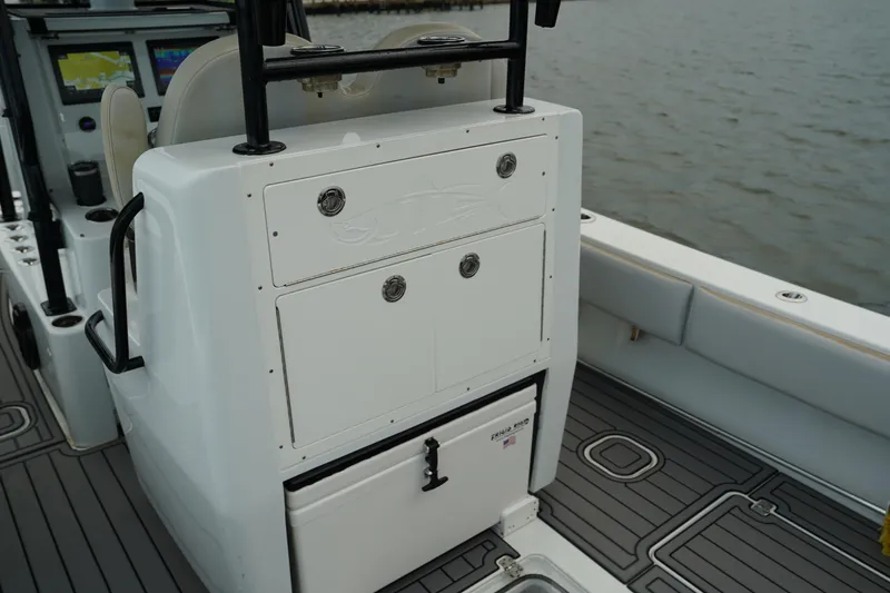  Yacht Photos Pics 2023 Andros 32 Offshore boat interior with storage compartments and seating.
