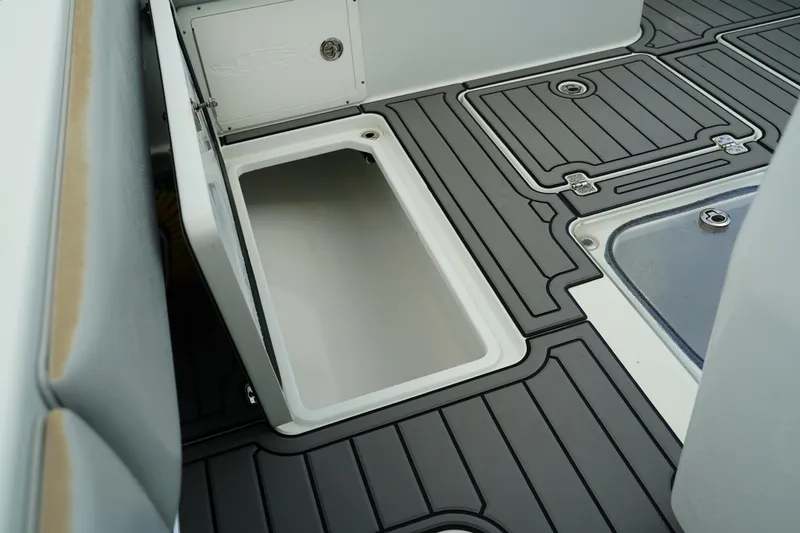  Yacht Photos Pics 2023 Andros 32 Offshore boat deck with storage compartment and non-slip flooring.