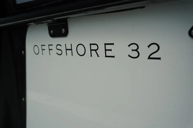  Yacht Photos Pics Andros 32 Offshore 2023 boat model nameplate close-up.