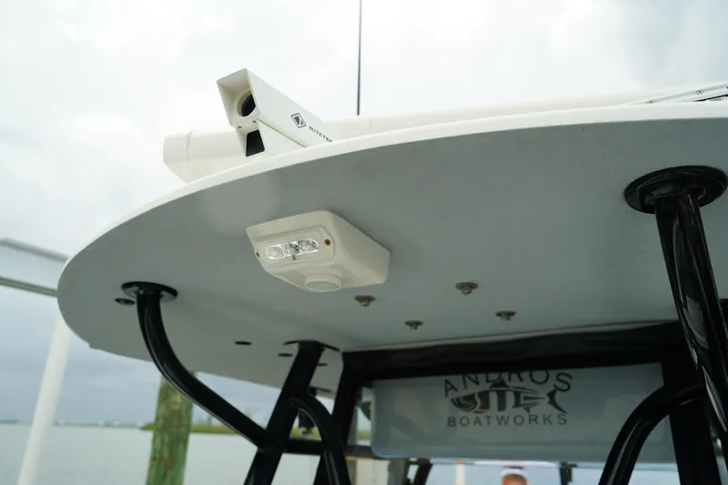  Yacht Photos Pics Andros 32 Offshore 2023 boat roof with mounted equipment and Andros Boatworks logo.